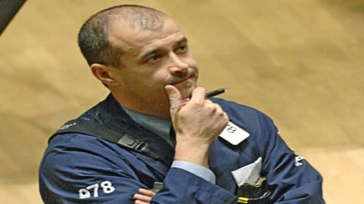 Christopher Walls, of Institutional Direct Inc., watches a monitor on the floor of  the New York Stock Exchange, Tuesday, Feb. 27,  2007, in New York. Wall Street fell sharply, joining a global stock decline sparked by growing concerns that the U.S. and Chinese economies are cooling and that U.S. stocks are about to embark on a major correction. (AP Photo/Henny Ray Abrams)